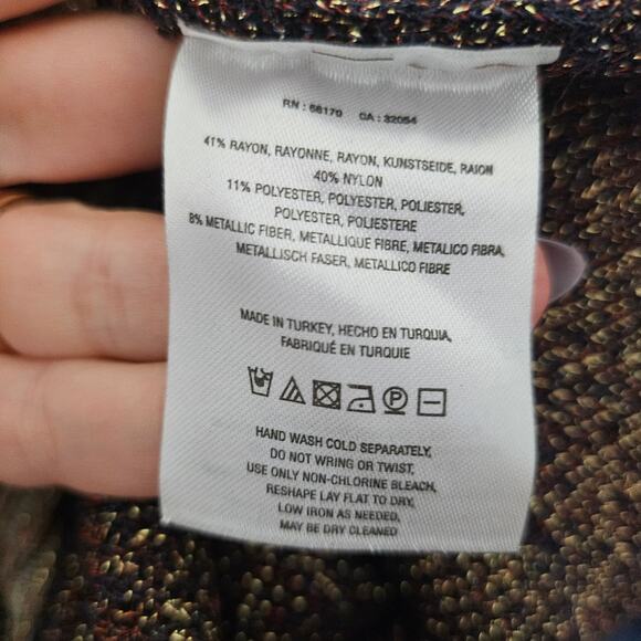 Anthropologie's Moth Metallic Peplum Tank - Picture 6 of 7